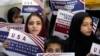 Afghan refugees rally in Islamabad after Washington suspended the U.S. Refugee Admission Program, on January 24.